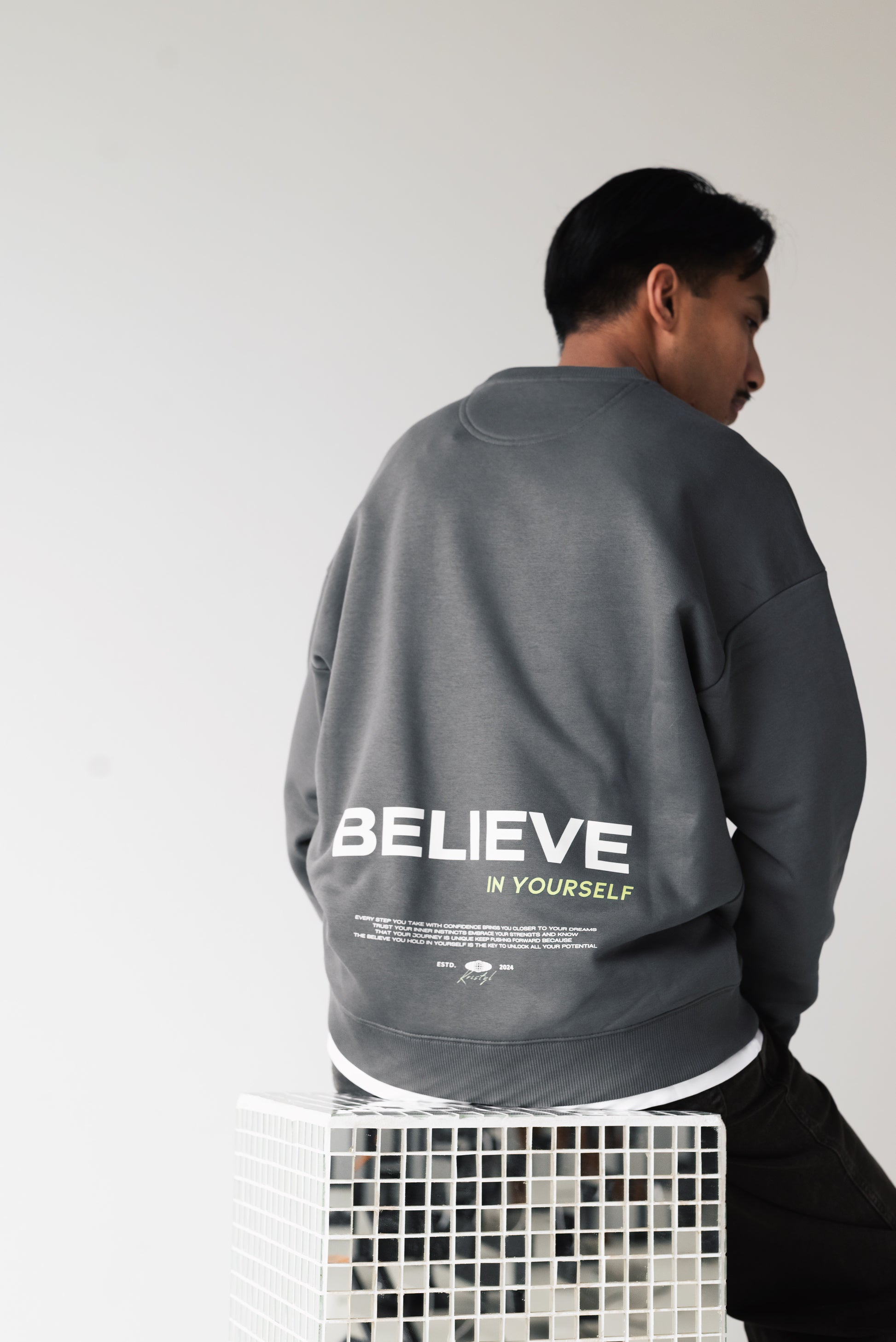 BELIEVE OVERSIZED SWEATER